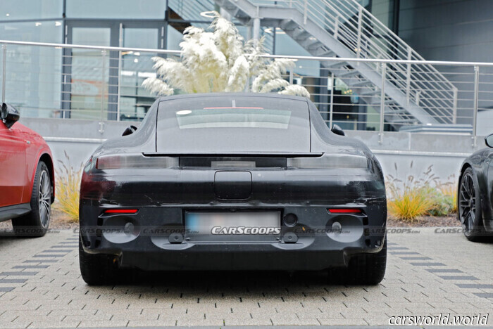 Porsche 718 Cayman EV Reveals Its True Identity Behind the Fake-911 Facade | Carscoops
